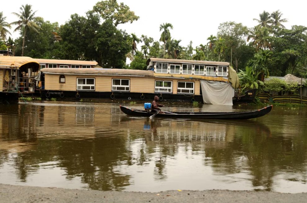 Houseboats and a canoe on the Alappuzha backwaters