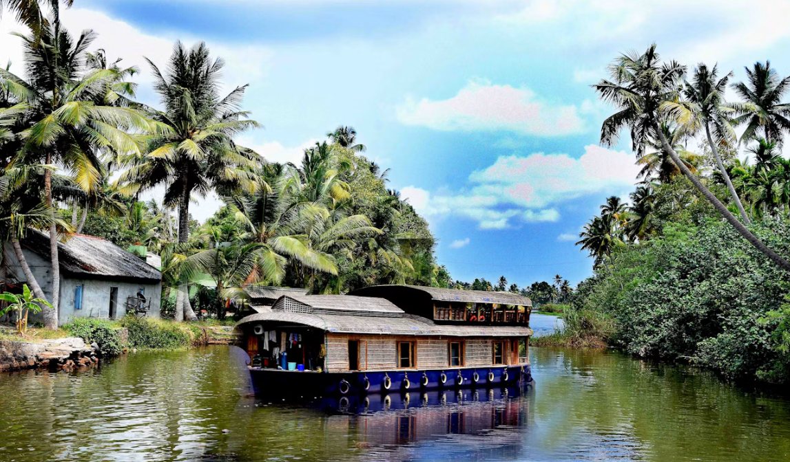 A houseboat passing a canal village